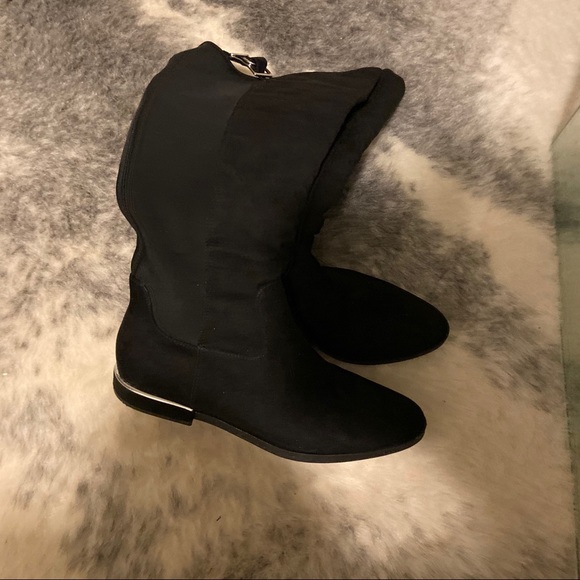 Designers knee high Calvin Klein boots